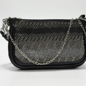 Stylish black handbag adorned with chain handle and rhinestones on a white background.